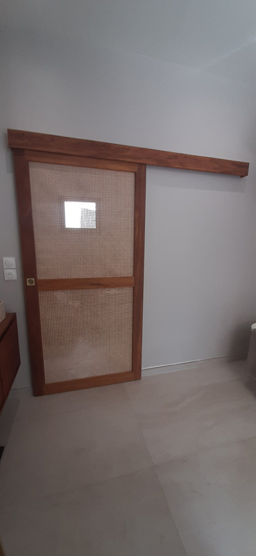 Porte coulissante en bois